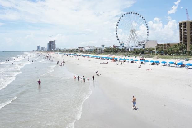 View from 14th Avenue pier with beach, boardwalk and SkyWheel
