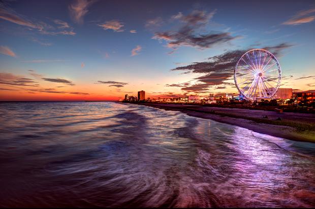 Dusk view of coast of Myrtle Beach with SkyWheel