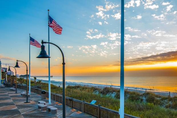 Boardwalk Sunrise with Flags