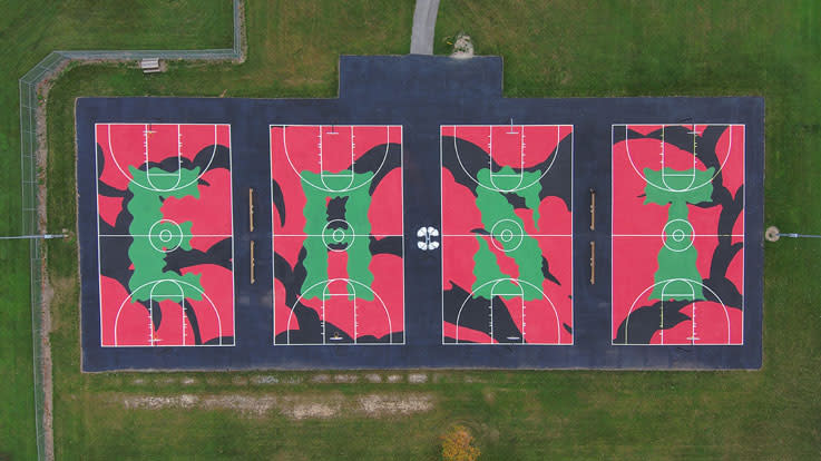 Aerial view of the EAST mural basketball courts by Andre Portee