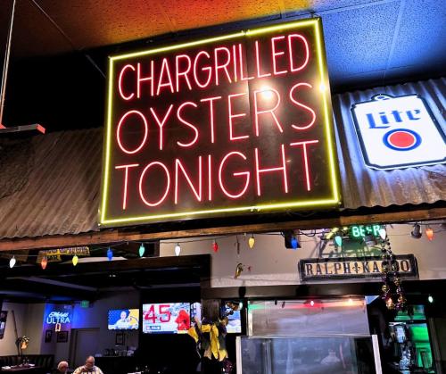 ralph and kacoos oyster sign