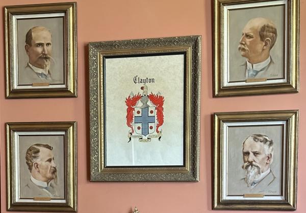 Portraits of the four Clayton brothers hang on the study wall in The Clayton House, Fort Smith, Arkansas.