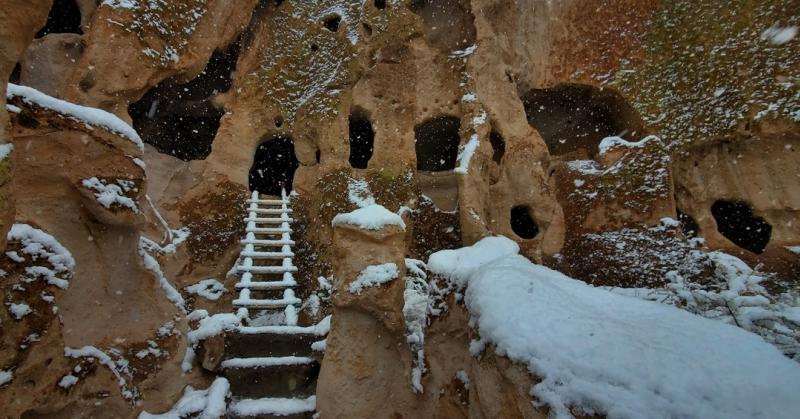 A ladder covered in snow at Bandelier National Monument
