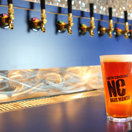 NC Beer Month beer on counter at bar