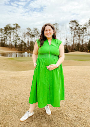 Woman Dressed for the Masters Tournament in green midi dress  from The Swank Company