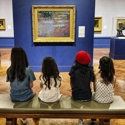 Dayton Art Institute visitors viewing Monet's Waterlilies painting