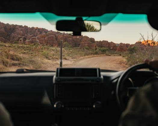 driving through purnululu national park with a view of the domes tourism western australia