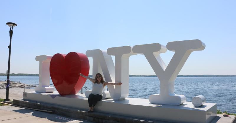 A large I (heart-shaped) Love NY sign stands along Seneca Lake