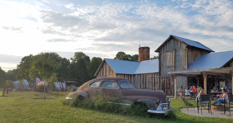 A summer evening at Cedar Creek Winery, Brewery & Distillery during a Drink at the Creek concert.