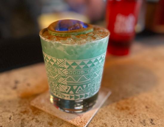 Blue cocktail with fire