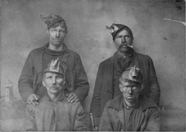 portrait of four minors employed by the EBT Railroad & Coal Co.
