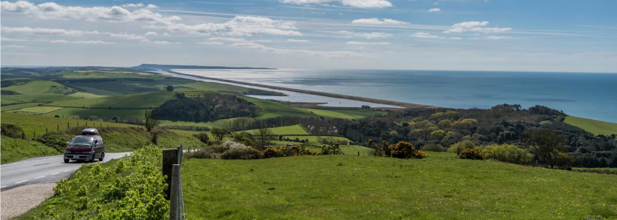 The coast road at Abbotsbury with views of Chesil Beach and the Fleet Lagoon