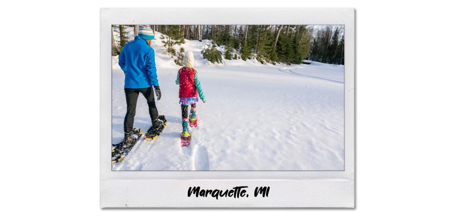 Mother and daughter snowshoeing in Marquette, MI