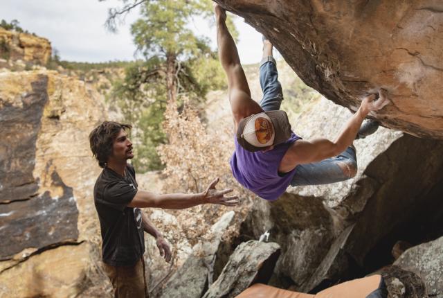 Eli Nogueira spots Scott Chapman on Coyote Sombrero, in Beaver Canyon. New Mexico Magazine