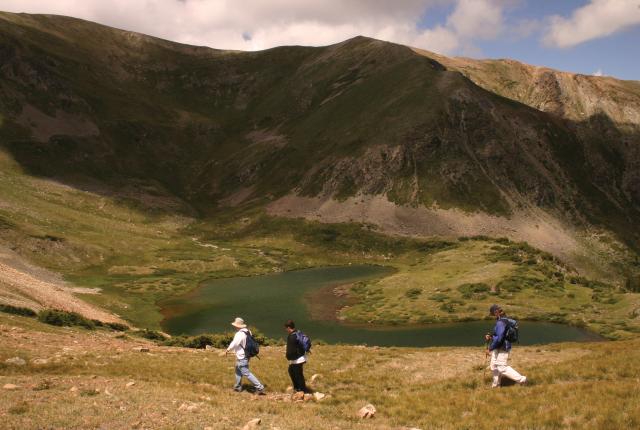 Hikers head to Horseshoe Lake after summiting Wheeler Peak