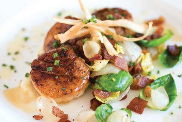 Mark Kiffin’s Seared Diver Sea Scallops with Parsnip Purée, Brussels Sprouts Leaves, and Smoked Bacon