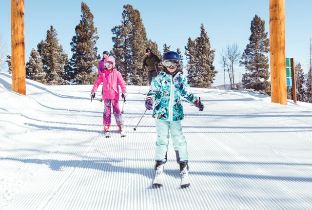 Two children skiing at Red River