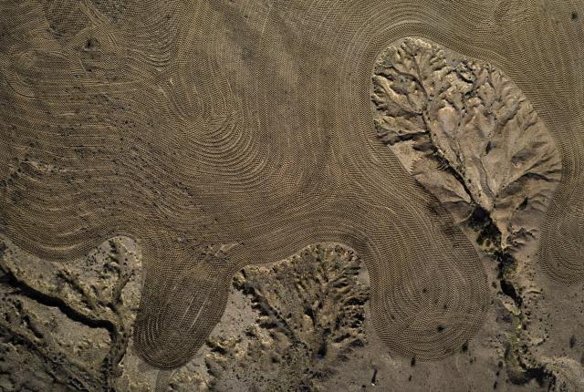 Seen from above, the land reveals a multitude of work—and of problems.