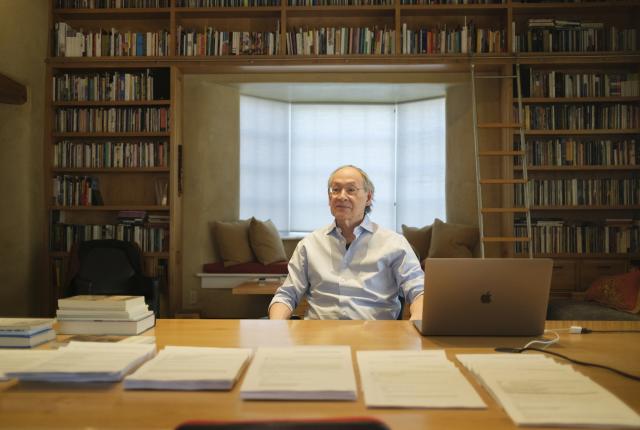 Arthur Sze relaxes in his Santa Fe writing studio.