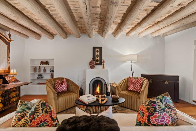 Exposed wooden ceiling vigas inside the historic Boyle House in Santa Fe, some dating back to the 1720s.