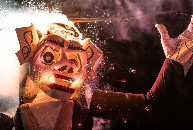 The 100th Burning of Zozobra in Santa Fe showcases a 70-foot marionette, a drone tribute, and dancing children, drawing large crowds.