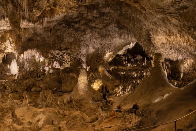 A high viewpoint affords visitors a quarter-mile-long glimpse into the Big Room’s ornate features at Carlsbad Caverns National Park.