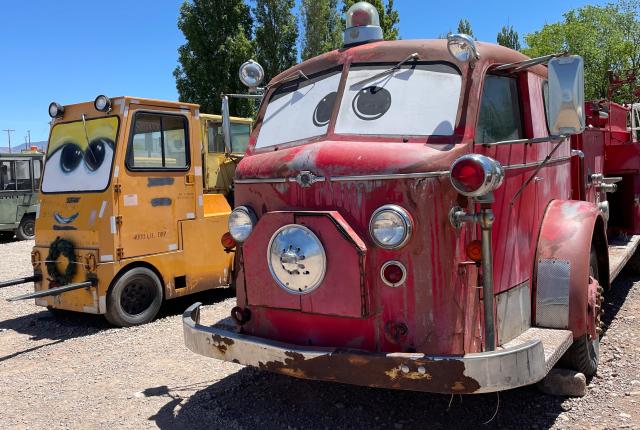 Lance Giest's collection of vintage vehicles with painted eyes in Tularosa, inspired by the movie "Cars," showcases unique personalities of each vehicle.