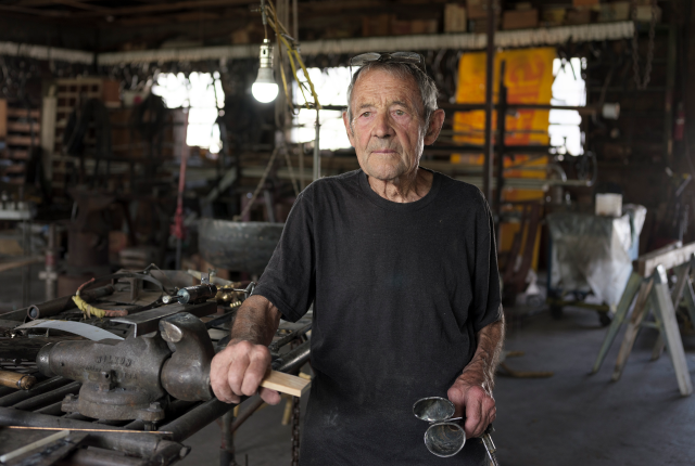 William A. Goodman in his Tinnie studio, a former gas station and auto garage.