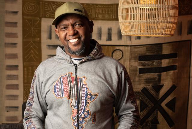 Ahmed Obo brings Afro-Caribbean flair to his personal style and his cuisine.