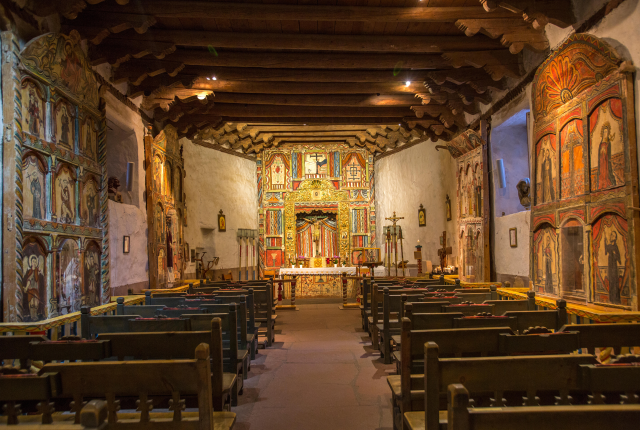 The interior of the Santuario de Chimayó, one of the state’s most beloved churches.