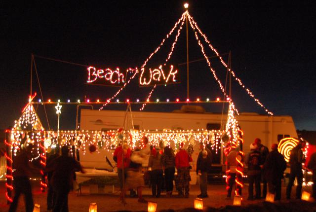 RV decked out in Christmas lights at the Elephant Butte Luminaria Beachwalk.