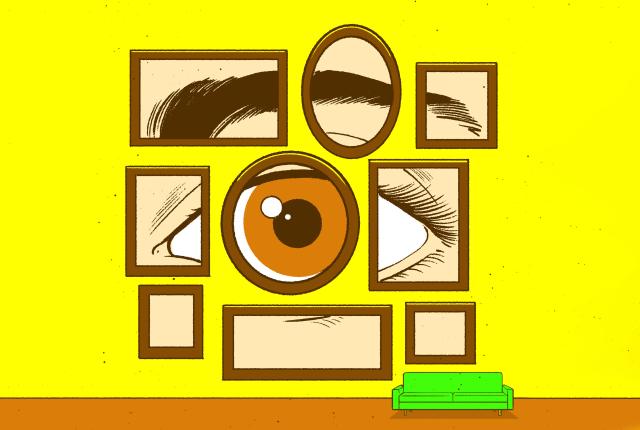 Large framed eye illustrations on a bright yellow wall above a small green couch.