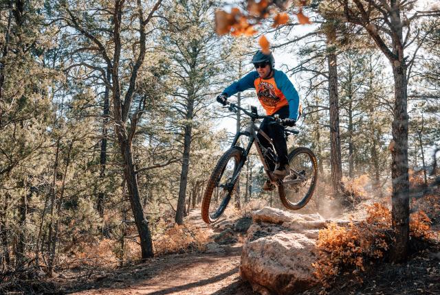 Justin Small speeds through a trail at Glorieta Camps.