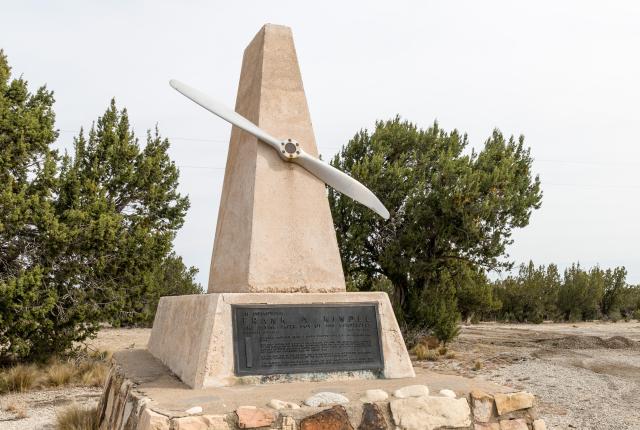 In 1964, the residents of Carlsbad erected a 10-foot-tall concrete obelisk, topped with a mounted propeller, to honor the contributions of Frank Kindel.