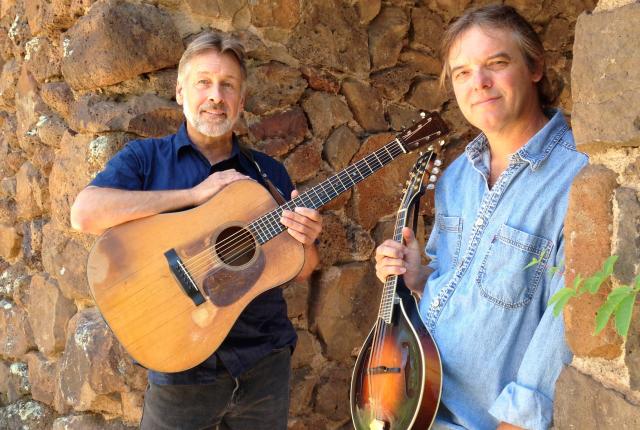 Enjoy intimate performances by folk duo Peter McLaughlin and Chris Brashear among others at the scenic Pickamania music festival in Kingston's Black Range Lodge.
