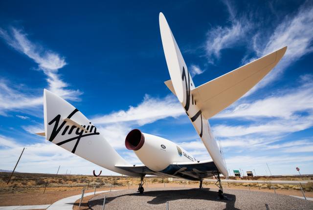A Virgin Galactic spaceship sits outside Spaceport America.