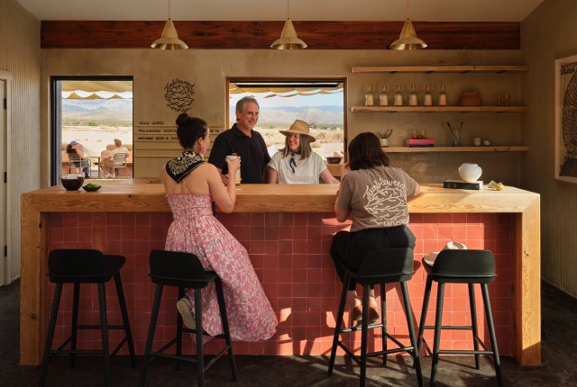 Owners Peter and Heather Kauffman serve up their craft sotol cocktails to guests.