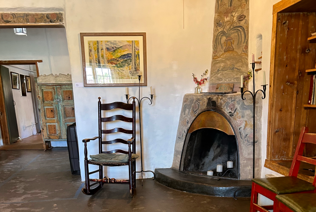 Artist Olive Rush painted her Santa Fe studio fireplace and lintel with frescos.