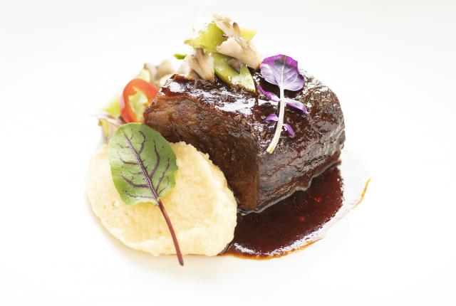 Wagyu beef short rib with duck-fat–whipped root vegetables from Coyote Cafe