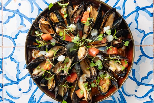 Taste mussels posole, a bold seafood twist on a New Mexico classic.