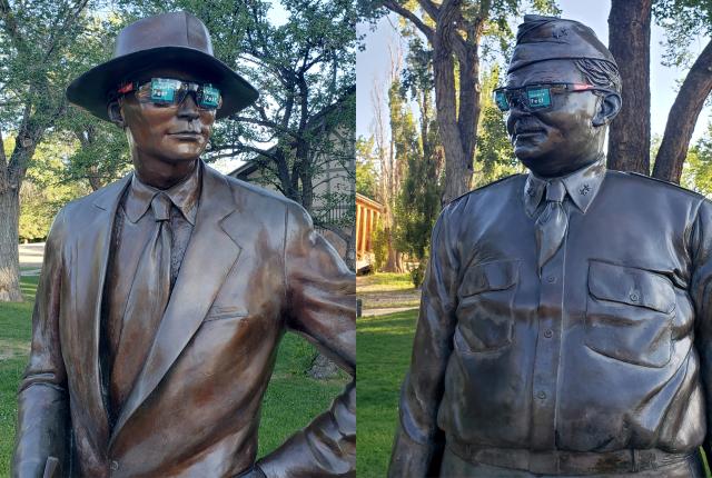 J. Robert Oppenheimer and Leslie Groves statues stand in downtown Los Alamos.