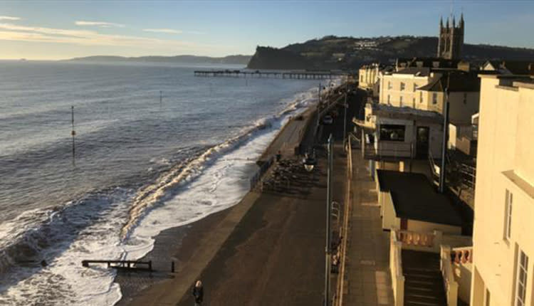 image shows a seafront with the B&B