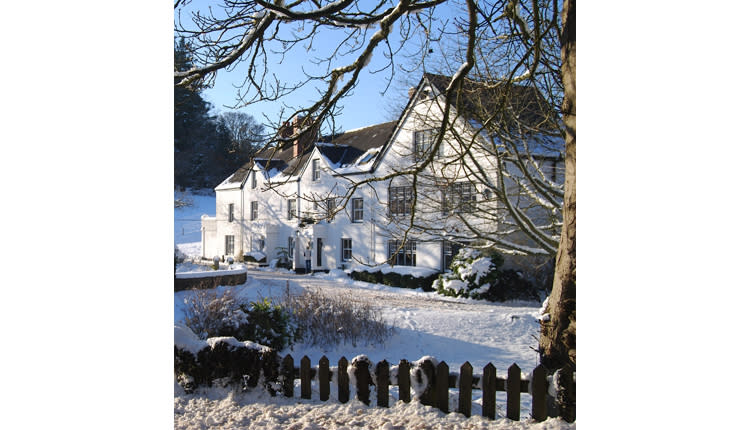 mill end hotel covered in snow