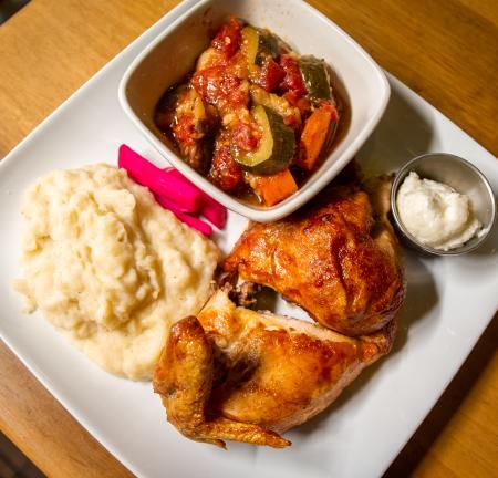 Plate of roasted chicken, vegetables and mashed potatoes from Rosine's Mediterranean Restaurant.