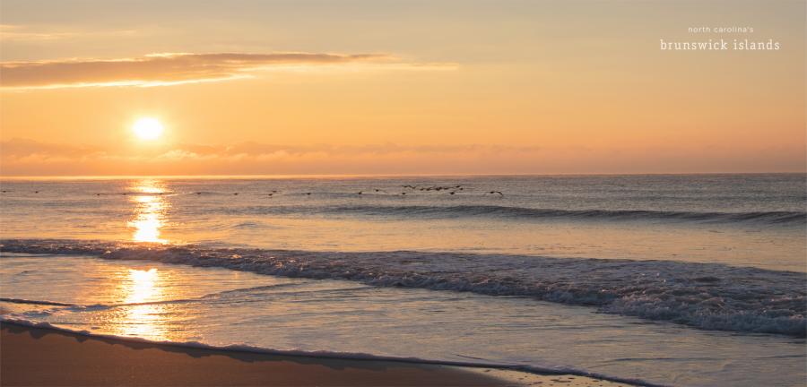 Sunrise over the ocean in Oak Island, NC.