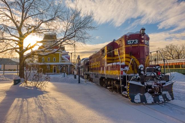 Conway Scenic Railroad Snow Train - Vintage Train in Front of Historic Train Station in Wintertime