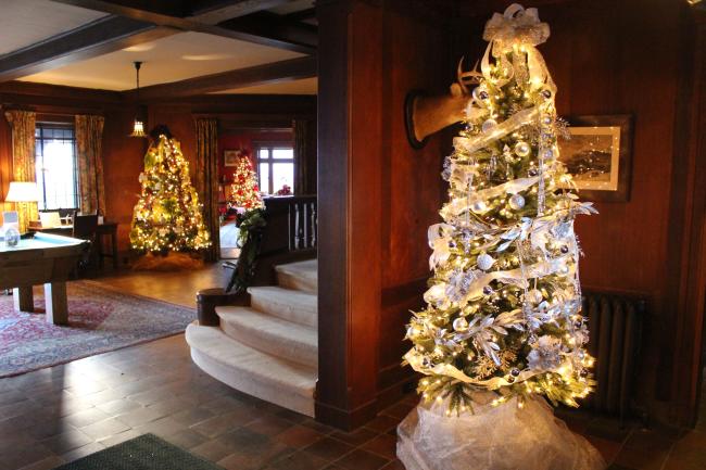 Castle in the Clouds - Historic Rooms Decorated with Christmas Trees