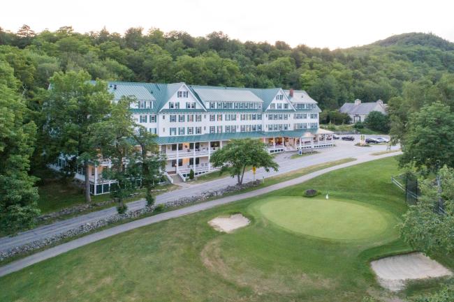 Eagle Mountain House Exterior View (Large Grand Resort Hotel Facade with Golf Green in Foreground)