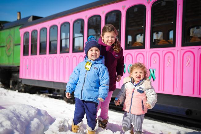 Cog Railway (Winter): Three Kids Standing in Front of Train