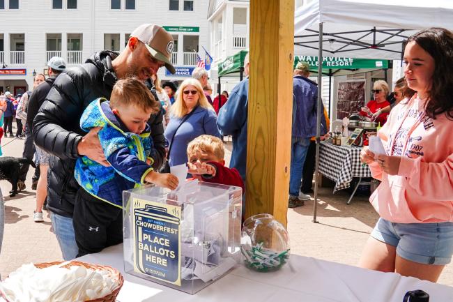 Chowderfest at Waterville Valley Resort - Family Voting for Their Favorite Chowder at Ballot Box
